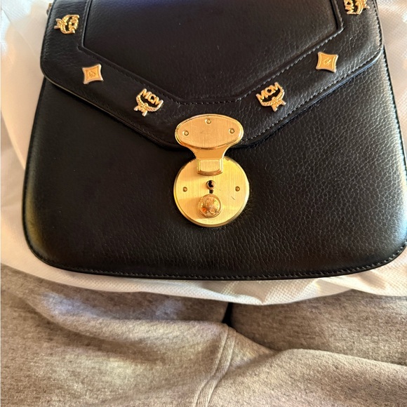 MCM Handbags - MCM Black and Gold Shoulder Bag